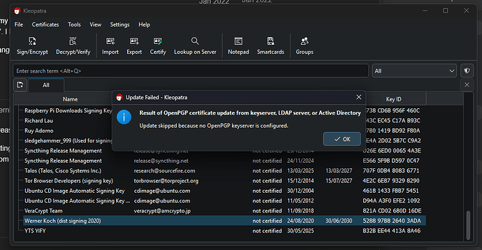 Screenshot of Kleopatra showing an error dialog saying "Update skipped because no OpenPGP keyserver is configured."